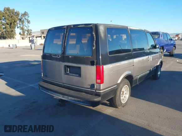 1991 Chevrolet Astro with VIN 1GNDM19Z2MB123653, listed as a IAAI auction lot 41388286 with 175,009 mi miles. Bid and sale history available at carsss.com. Image 4.