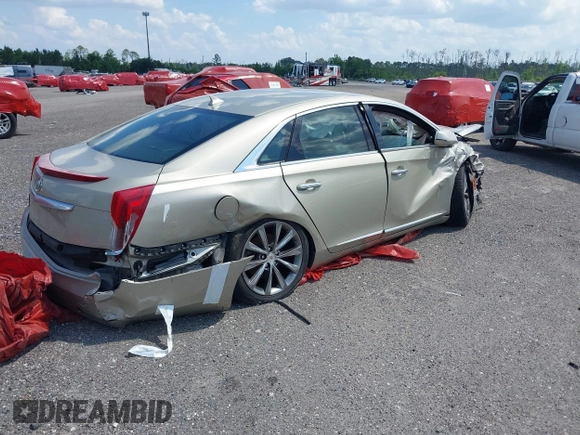 2014 Cadillac XTS z VIN 2G61L5S39E9159583, wystawiony jako IAAI lot #36024597 z przebiegiem 118 461 mil mil oraz . Historia ofert i sprzedaży dostępna na DreamBid. Obrazek 4.
