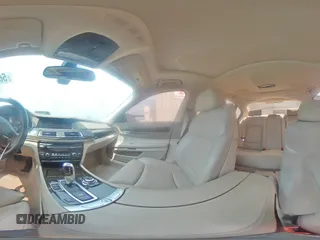 2012 BMW 7 Series 750Li with VIN WBAKB8C51CC962834, listed as a Copart auction lot 56592645 with 72,665 mi miles and Salvage title. Bid and sale history available at DreamBid. Image 14.