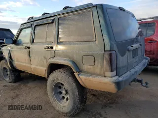 1997 Jeep Cherokee Country with VIN 1J4FJ78SXVL566804, listed as a Copart auction lot 88557395 with 216,230 mi miles and Salvage title. Bid and sale history available at DreamBid. Image 2.