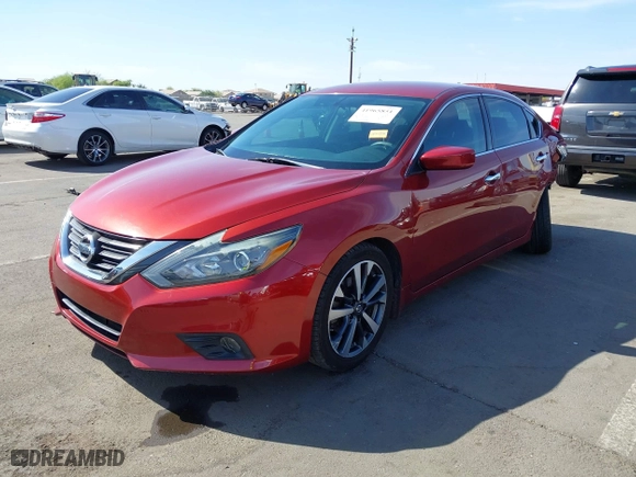 2016 Nissan Altima 2.5 SL with VIN 1N4AL3AP4GC122089, listed as a IAAI auction lot 41965851 with 121,608 mi miles. Bid and sale history available at carsss.com. Image 2.