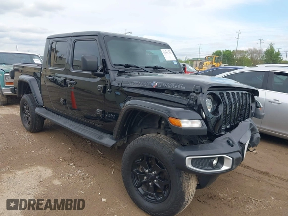 2021 Jeep Gladiator Freedom z VIN 1C6HJTAG4ML586999, wystawiony jako IAAI lot #41911751 z przebiegiem 81 030 mil mil oraz . Historia ofert i sprzedaży dostępna na DreamBid. Obrazek 1.