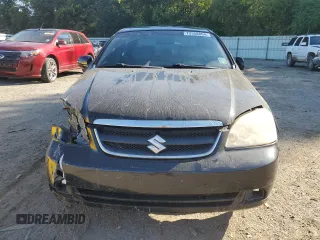 2007 Suzuki Forenza z VIN KL5JD56Z27K530714, wystawiony jako Copart lot #73358864 z przebiegiem 127 196 mil mil oraz Szkody całkowita. Historia ofert i sprzedaży dostępna na DreamBid. Obrazek 5.