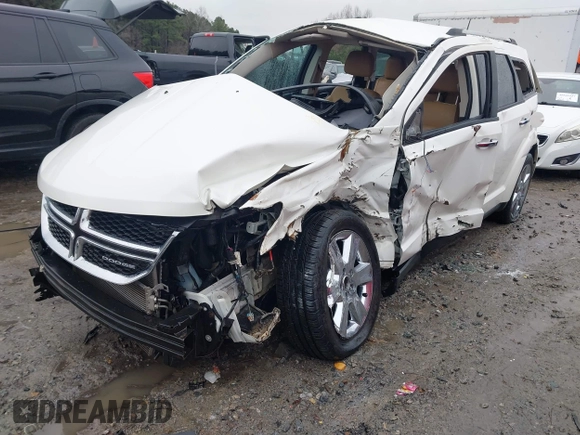 2012 Dodge Journey Crew with VIN 3C4PDCDG7CT165224, listed as a IAAI auction lot 41568580 with 140,211 mi miles and . Bid and sale history available at DreamBid. Image 2.