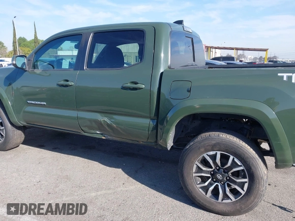 2021 Toyota Tacoma SR z VIN 3TMCZ5AN7MM395940, wystawiony jako IAAI lot #41860127 z przebiegiem 39 338 mil mil oraz . Historia ofert i sprzedaży dostępna na DreamBid. Obrazek 14.