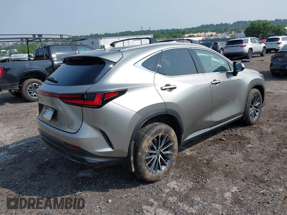 2024 Lexus NX 350h Premium z VIN 2T2GKCEZ6RC019104, wystawiony jako IAAI lot #42475819 z przebiegiem 15 870 mil mil oraz . Historia ofert i sprzedaży dostępna na DreamBid. Obrazek 4.