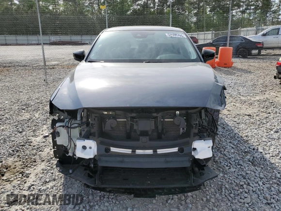 2024 Mazda CX-5 S Carbon Edition z VIN JM3KFBCL5R0493025, wystawiony jako Copart lot #52596785 z przebiegiem 12 360 mil mil oraz Szkoda całkowita • Salvage title. Historia ofert i sprzedaży dostępna na DreamBid. Obrazek 5.