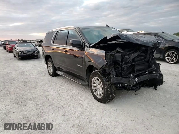 2021 Chevrolet Tahoe LS z VIN 1GNSCMKD5MR229435, wystawiony jako Copart lot #81240864 z przebiegiem 103 660 mil mil oraz Nie do naprawy • Non repairable. Historia ofert i sprzedaży dostępna na DreamBid. Obrazek 11.