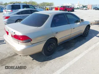 2002 Honda Accord LX with VIN 3HGCG56412G702456, listed as a IAAI auction lot 42040650 with 203,310 mi miles and . Bid and sale history available at DreamBid. Image 4.