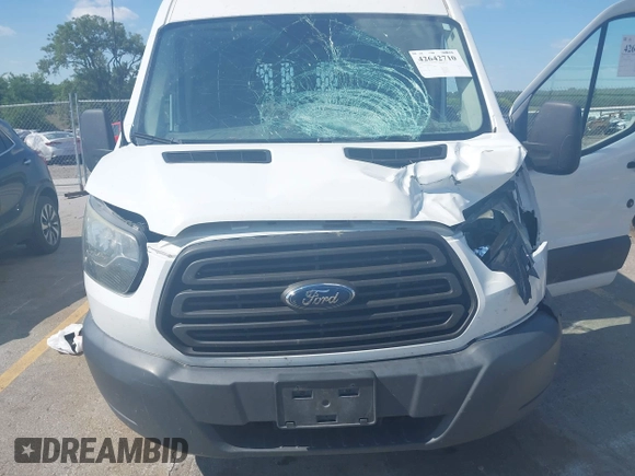 2015 Ford Transit Cargo z VIN 1FTNR2CG1FKB04641, wystawiony jako IAAI lot #42642710 z przebiegiem 136 892 mil mil oraz . Historia ofert i sprzedaży dostępna na DreamBid. Obrazek 6.