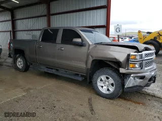 2015 Chevrolet Silverado 1500 LT with VIN 1GCUKREC5FF199913, listed as a Copart auction lot 58476584 with 129,616 mi miles and Salvage Title. Bid and sale history available at carsss.com. Image 4.