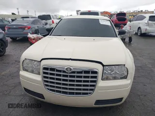 2006 Chrysler 300 with VIN 2C3KA43RX6H470150, listed as a IAAI auction lot 41767272 with 107,457 mi miles. Bid and sale history available at carsss.com. Image 12.