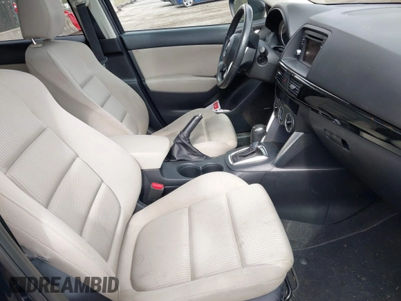 2015 Mazda CX-5 Touring with VIN JM3KE4CY5F0453646, listed as a IAAI auction lot 41740574 with 91,167 mi miles. Bid and sale history available at carsss.com. Image 5.