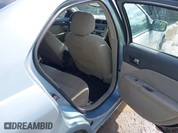 2011 Ford Fusion Hybrid z VIN 3FADP0L30BR123857, wystawiony jako IAAI lot #42534556 z przebiegiem 144 811 mil mil oraz . Historia ofert i sprzedaży dostępna na DreamBid. Obrazek 8.