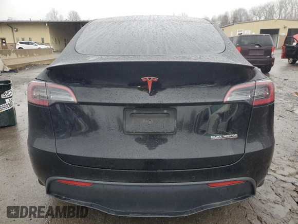 2022 Tesla Model Y Performance z VIN 7SAYGDEF9NF382883, wystawiony jako Copart lot #52028085 z przebiegiem 49 108 mil mil oraz Szkoda całkowita • Salvage title. Historia ofert i sprzedaży dostępna na DreamBid. Obrazek 6.