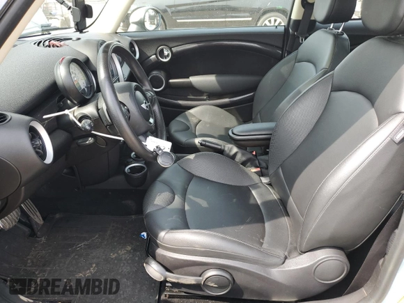 2013 MINI Hardtop S with VIN WMWSV3C52DT396033, listed as a Copart auction lot 61041585 with 83,873 mi miles and Salvage title. Bid and sale history available at DreamBid. Image 7.