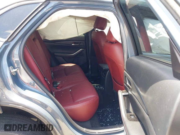 2022 Mazda CX-30 S Carbon Edition with VIN 3MVDMBCL6NM410330, listed as a IAAI auction lot 42107426 with 30,277 mi miles and . Bid and sale history available at DreamBid. Image 8.