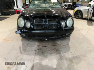 2000 Mercedes-Benz CLK 320/430 z VIN WDBLK65G5YT031236, wystawiony jako IAAI lot #41972975 z przebiegiem 144 665 mil mil oraz . Historia ofert i sprzedaży dostępna na DreamBid. Obrazek 6.