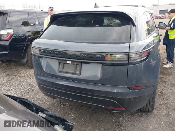 2025 Land Rover Range Rover Velar Dynamic SE with VIN SALYL2EX9SA809479, listed as a IAAI auction lot 42150495 with 7,038 mi miles and . Bid and sale history available at DreamBid. Image 16.