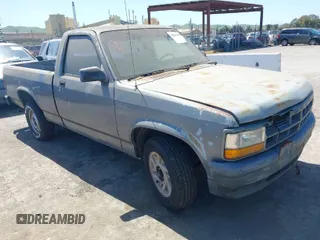 1992 Dodge Dakota "S" with VIN 1B7FL26X5NS691362, listed as a IAAI auction lot 42001454 with 161,181 mi miles. Bid and sale history available at carsss.com. Image 1.