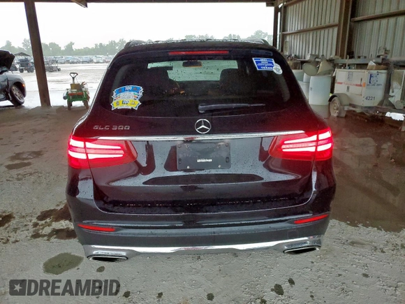 2019 Mercedes-Benz GLC 300 with VIN WDC0G4JB2KF587198, listed as a Copart auction lot 60434795 with 74,546 mi miles and Salvage title. Bid and sale history available at DreamBid. Image 6.
