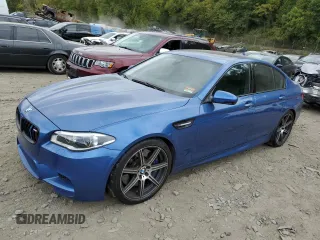 2014 BMW M5 z VIN WBSFV9C5XED097563, wystawiony jako Copart lot #72175354 z przebiegiem 73 406 mil mil oraz Szkody całkowita. Historia ofert i sprzedaży dostępna na DreamBid. Obrazek 1.