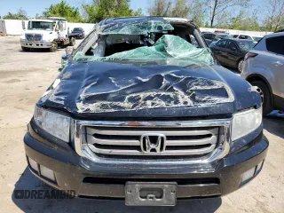 2013 Honda Ridgeline RTL z VIN 5FPYK1F5XDB010362, wystawiony jako Copart lot #50763704 z przebiegiem 134 745 mil mil oraz Szkoda całkowita • Salvage title. Historia ofert i sprzedaży dostępna na DreamBid. Obrazek 5.