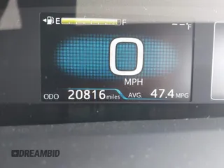 2021 Toyota Prius L Eco with VIN JTDKAMFU4M3144985, listed as a IAAI auction lot 42443957 with 20,816 mi miles and . Bid and sale history available at DreamBid. Image 15.