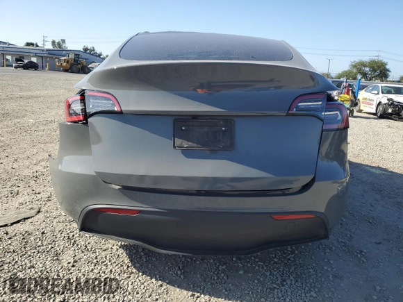 2024 Tesla Model Y Long Range with VIN 7SAYGDEE1RA245642, listed as a Copart auction lot 55490385 with Not provided miles and Salvage title. Bid and sale history available at DreamBid. Image 6.