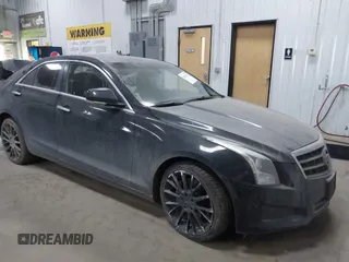 2014 Cadillac ATS Luxury AWD z VIN 1G6AH5RX1E0112035, wystawiony jako IAAI lot #41810942 z przebiegiem 113 717 mil mil oraz . Historia ofert i sprzedaży dostępna na DreamBid. Obrazek 1.