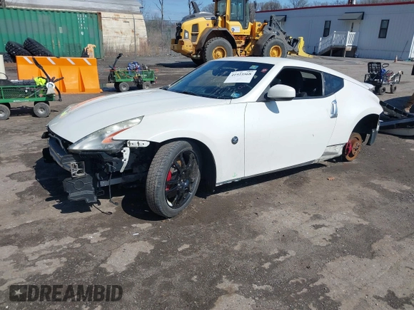 2014 Nissan 370Z with VIN JN1AZ4EH8EM634403, listed as a IAAI auction lot 41923568 with 137,676 mi miles. Bid and sale history available at carsss.com. Image 17.