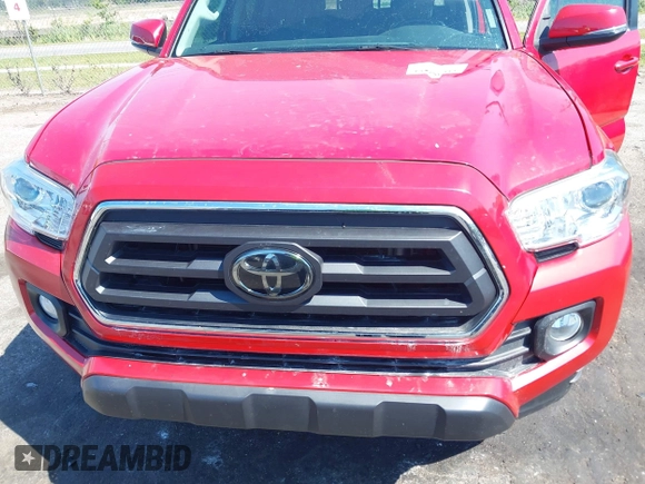 2022 Toyota Tacoma SR with VIN 3TMCZ5AN7NM470900, listed as a IAAI auction lot 42060911 with 38,869 mi miles and . Bid and sale history available at DreamBid. Image 6.