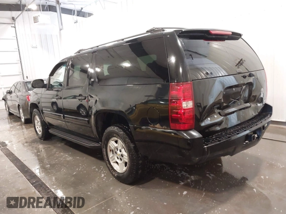 2007 Chevrolet Suburban LTZ with VIN 1GNFK16367R231896, listed as a IAAI auction lot 41979944 with 202,137 mi miles. Bid and sale history available at carsss.com. Image 3.