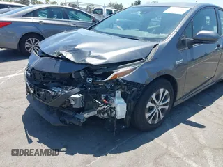 2021 Toyota Prius LE with VIN JTDKAMFPXM3170372, listed as a IAAI auction lot 42661609 with 47,977 mi miles and . Bid and sale history available at DreamBid. Image 6.