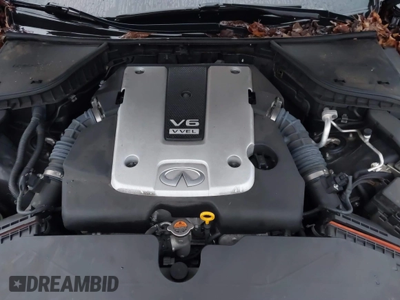 2015 Infiniti Q50 Premium z VIN JN1BV7ARXFM412382, wystawiony jako IAAI lot #40776813 z przebiegiem 66 406 mil mil oraz . Historia ofert i sprzedaży dostępna na DreamBid. Obrazek 10.
