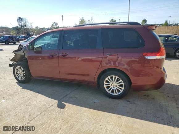 2014 Toyota Sienna XLE with VIN 5TDYK3DC4ES444487, listed as a Copart auction lot 50873395 with 230,650 mi miles and Salvage Title. Bid and sale history available at carsss.com. Image 2.