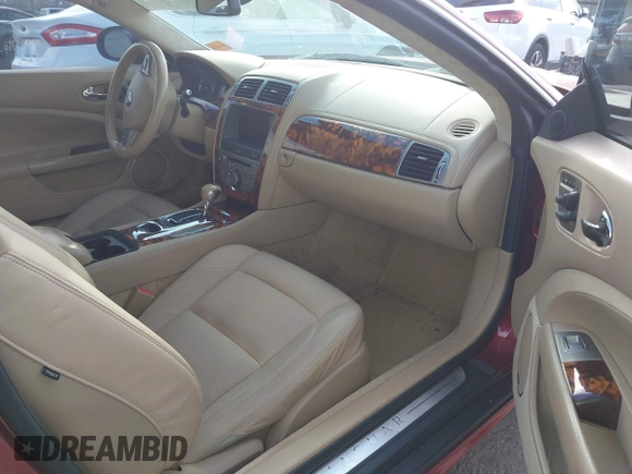 2008 Jaguar XK with VIN SAJWA43C089B22700, listed as a IAAI auction lot 41585734 with 67,946 mi miles. Bid and sale history available at carsss.com. Image 5.