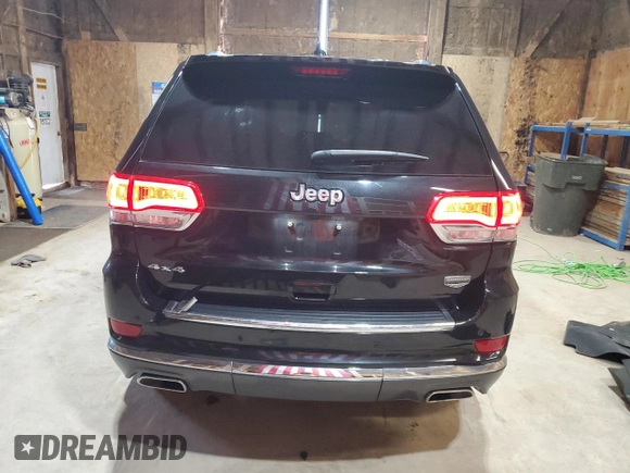 2014 Jeep Grand Cherokee Summit with VIN 1C4RJFJT7EC398488, listed as a Copart auction lot 57593975 with 64,630 mi miles and Clean title. Bid and sale history available at DreamBid. Image 6.