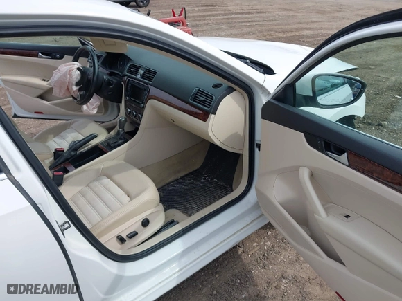 2012 Volkswagen Passat SEL with VIN 1VWCP7A30CC090499, listed as a IAAI auction lot 42037393 with 174,582 mi miles. Bid and sale history available at carsss.com. Image 5.