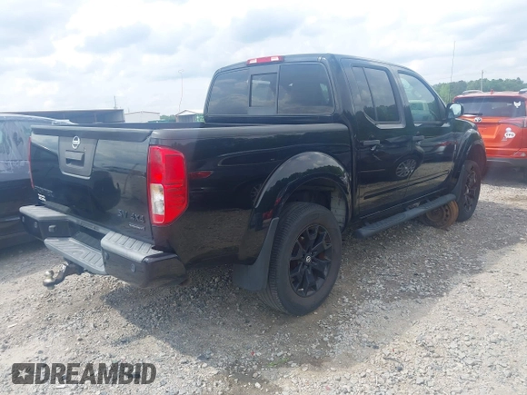 2018 Nissan Frontier SV with VIN 1N6AD0EV0JN744891, listed as a IAAI auction lot 42128481 with 137,412 mi miles and . Bid and sale history available at DreamBid. Image 4.