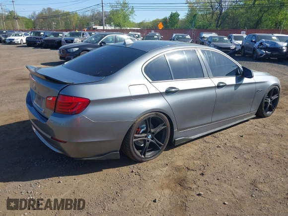 2011 BMW 5 Series 528i with VIN WBAFR1C51BC740751, listed as a IAAI auction lot 42143205 with 187,607 mi miles and . Bid and sale history available at carsss.com. Image 4.