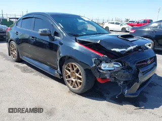 2015 Subaru WRX Limited with VIN JF1VA1G67F8809515, listed as a IAAI auction lot 42003173 with 112,414 mi miles. Bid and sale history available at carsss.com. Image 1.