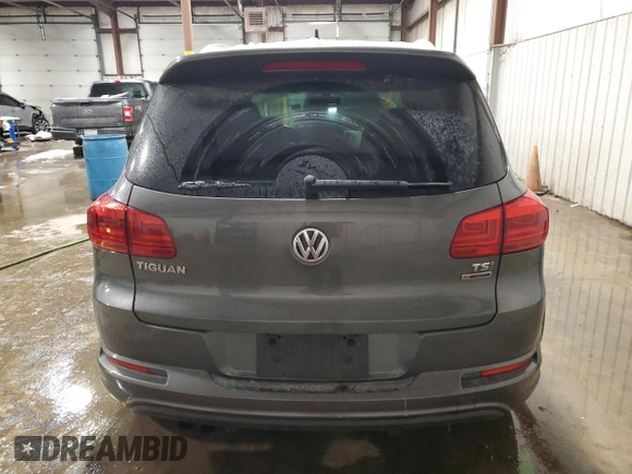 2016 Volkswagen Tiguan R-Line with VIN WVGBV7AX4GW085961, listed as a Copart auction lot 41828715 with 102,369 mi miles and Salvage Title. Bid and sale history available at DreamBid. Image 6.