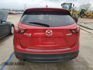 2016 Mazda CX-5 Grand Touring with VIN JM3KE4DY5G0660201, listed as a Copart auction lot 52165205 with 108,231 mi miles and Salvage Title. Bid and sale history available at DreamBid. Image 6.