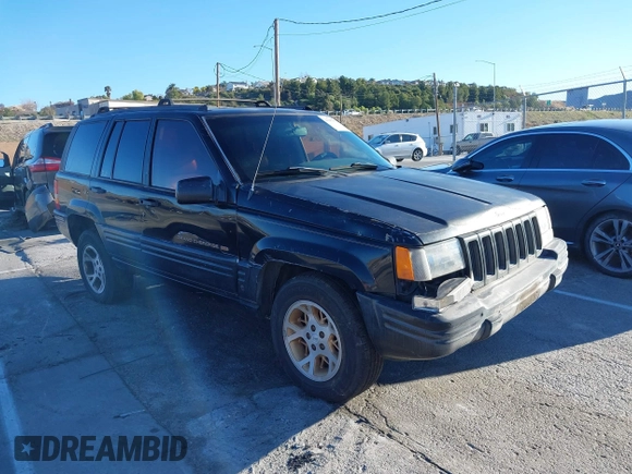 1998 Jeep Grand Cherokee Limited with VIN 1J4GX78Y8WC110325, listed as a IAAI auction lot 41357373 with 165,106 mi miles. Bid and sale history available at carsss.com. Image 1.