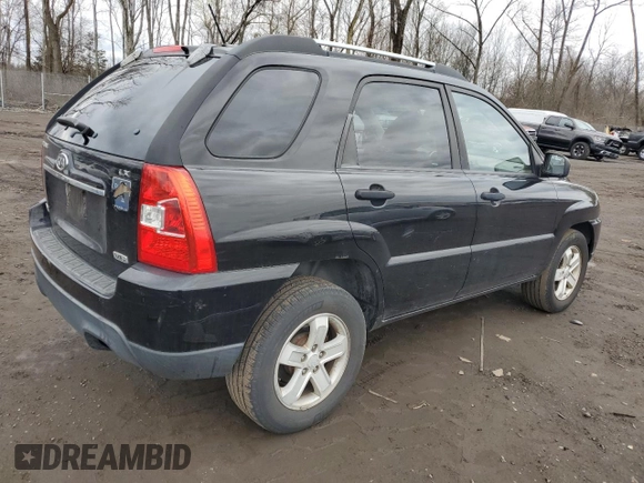 2009 Kia Sportage LX with VIN KNDJE723097622429, listed as a Copart auction lot 52960575 with 167,492 mi miles and Salvage Title. Bid and sale history available at carsss.com. Image 3.