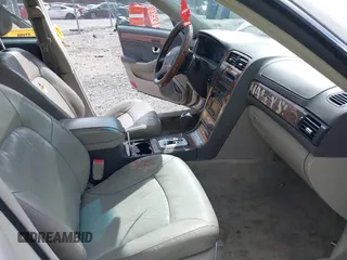2004 Hyundai XG350 with VIN KMHFU45E74A295703, listed as a IAAI auction lot 41812146 with 176,111 mi miles. Bid and sale history available at carsss.com. Image 5.