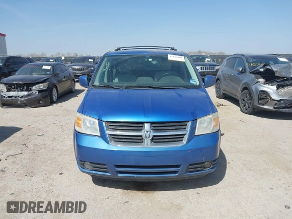 2008 Dodge Grand Caravan SXT with VIN 2D8HN54P18R795149, listed as a IAAI auction lot 41828264 with 144,432 mi miles and . Bid and sale history available at DreamBid. Image 12.