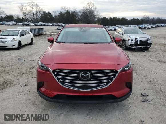 2022 Mazda CX-9 Touring with VIN JM3TCBCY2N0607128, listed as a Copart auction lot 86246044 with 61,526 mi miles and Salvage Title. Bid and sale history available at DreamBid. Image 5.