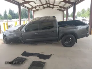 2019 Toyota Tacoma SR z VIN 3TMCZ5AN1KM257081, wystawiony jako IAAI lot #42211385 z przebiegiem 60 229 mil mil oraz . Historia ofert i sprzedaży dostępna na DreamBid. Obrazek 15.